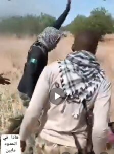 A screenshot from the video showing the Nigerian Flag on a soldiers outfit.